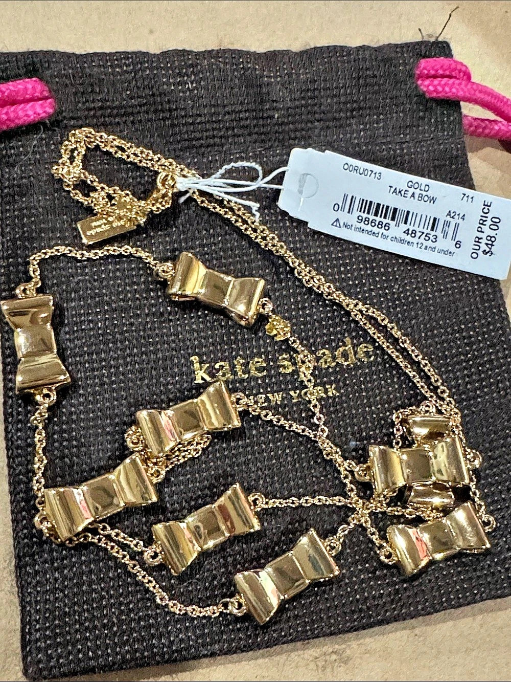Kate Spade Take a Bow Statement Necklace Gold NWT